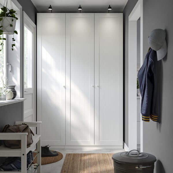 Modern entryway with large PAX wardrobe, bench, and hooks.