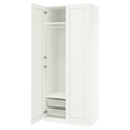 An open white ikea PAX wardrobe with shelves and mesh baskets.