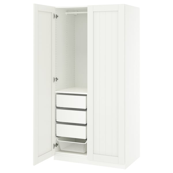 A white PAX wardrobe with one door open, revealing shelves and a drawer.