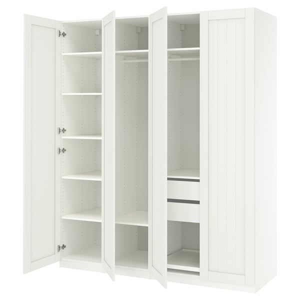 White, three-sectioned PAX wardrobe with open doors, showcasing shelves and compartments.