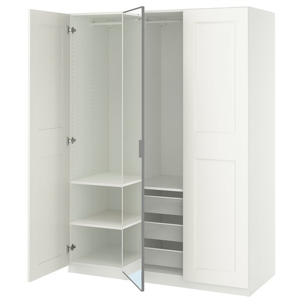 White PAX wardrobe with mirror door and open shelves; modern design.