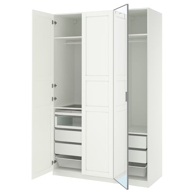 White PAX wardrobe with mirrored doors and organized drawers.