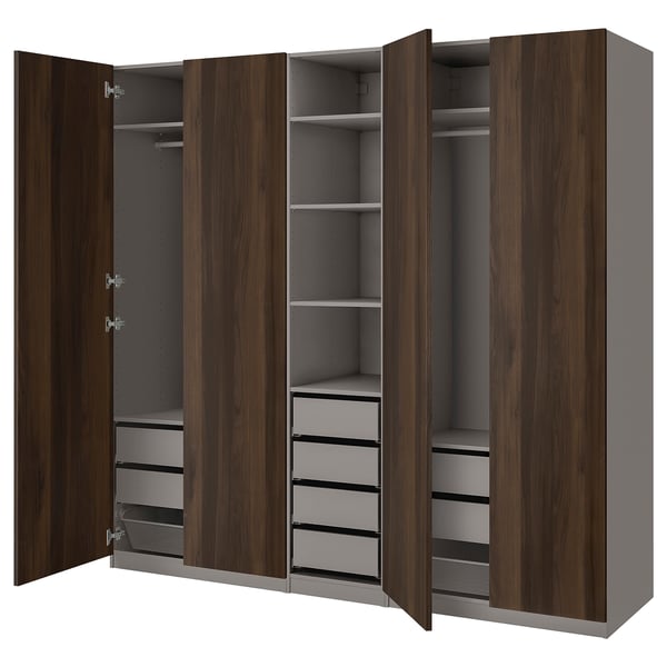 An open wooden wardrobe named PAX, featuring shelves and drawers for storage.