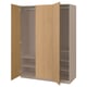 An open wooden PAX wardrobe with shelves.