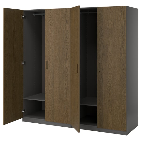 An open storage unit named PAX, featuring four wooden doors with oak veneer, and adjustable shelves inside.