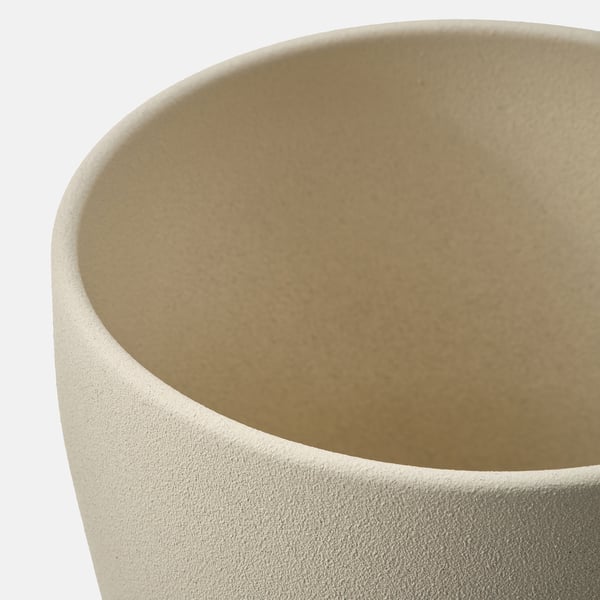 Close-up of matte off-white planter.