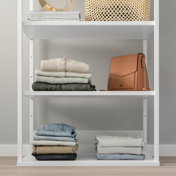 PLATSA shelves with clothes and bag.