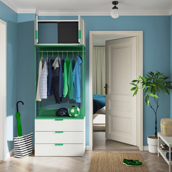 Green and white PLATSA wardrobe stores clothes, sports gear, and has adjustable feet for uneven floors.