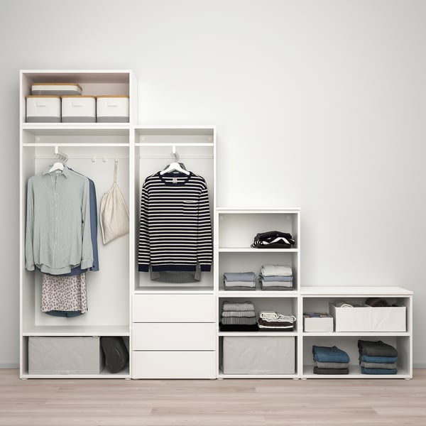 Modern closet with hanging shirts, folded clothes, and storage boxes, designed to fit various spaces and storage needs.