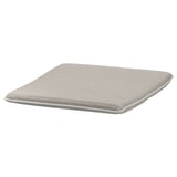 A square-shaped, beige POÄNG cushion with smooth texture and stitched design, made from polyester and polyurethane foam, for added comfort.