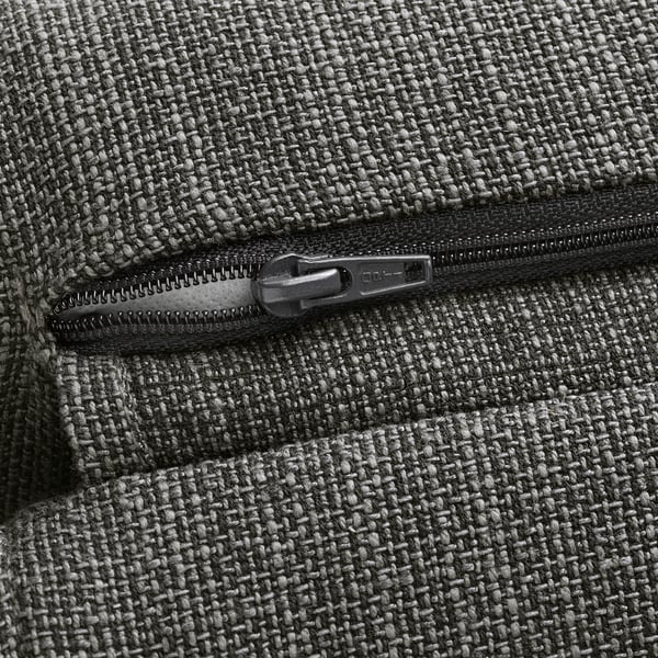 Zip on grey fabric, showing durable, high-quality material and smooth functionality.