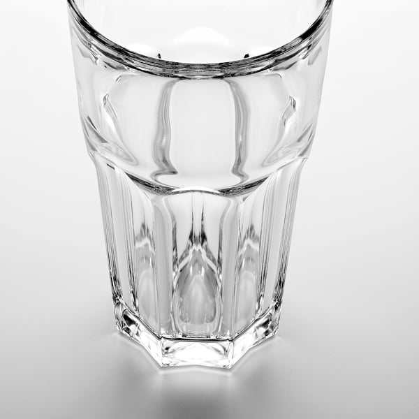 Clear, elegant glass with textured design, reflecting light. Sturdy and well-crafted.