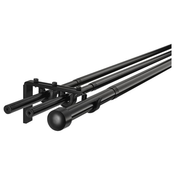 Black curtain rod set with three adjustable rods; sleek modern design, ideal for layered curtains.