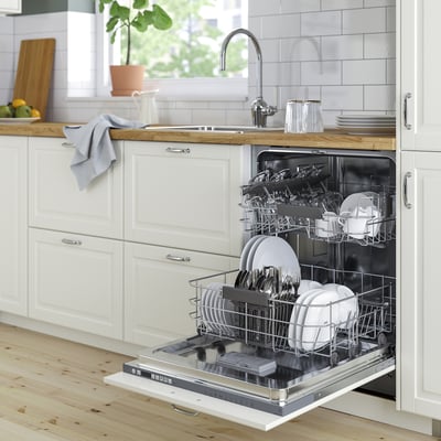 Modern quiet RÅGLANDA dishwasher in kitchen with clean dishes.