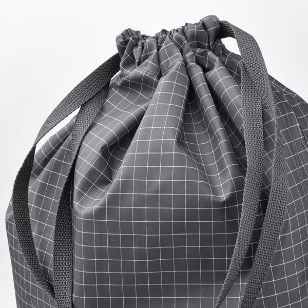 Black grid-patterned backpack with sturdy, padded shoulder straps, quality zippers, and durable fabric.