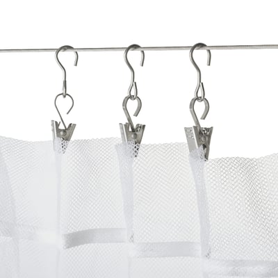 Three white curtains hung evenly with clips and s-hooks on a metal rod.