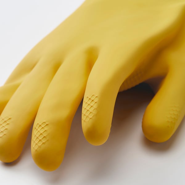 Yellow gloves with textured grips, durable, flexible; white background.