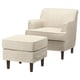 Beige ROCKSJÖN armchair, fabric, curved design with matching footstool.