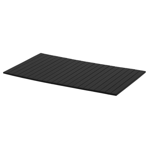 A black rectangular bamboo tray with vertical grooves.