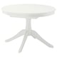 A white ROSENTORP round dining table with four legs, designed for easy extension.