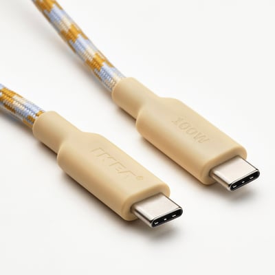 A RUNDHULT usb-c charging cable, beige and grey, coiled with a loop at one end for storage.