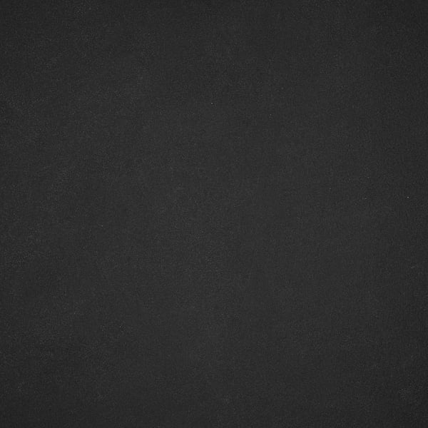 Black high-pressure porcelain wall panel, smooth, sleek, and textured; perfect for hygienic and easy-to-clean kitchen surfaces.