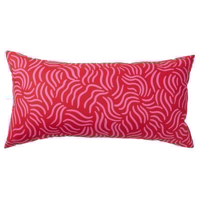 A red rectangular SANDMOTT cushion with pink abstract patterns. It a scandinavian design, made with 100% cotton and mixed fibre filling.