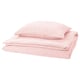 Pale pink SCHERSMIN organic cotton bedding set with wavy texture and envelope closure.