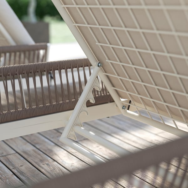 Beige SEGERÖN outdoor chair with woven back, adjustable reclining seat, powder-coated metal frame.