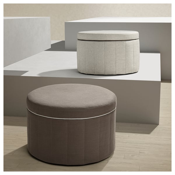Round ottomans, grey and beige, fabric-covered, pleated design, storage inside.