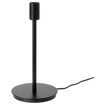 SKAFTET lamp base, black. Sleek, vertical design with circular base, plastic ring, and metallic details. Modern minimalist style for versatile use.