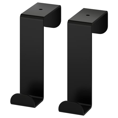 Two black SKOGSVIKEN hooks. They are metallic with a sleek, angular design, made for hanging towels or robes over a door.