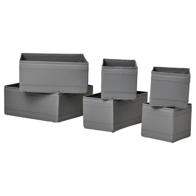Six grey SKUBB boxes, three stacked in back, three in front, rectangular shape with mesh tops, made from recycled polyester fabric.