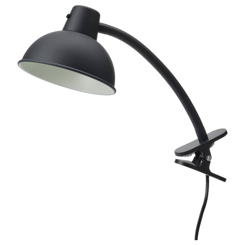 SKURUP black lamp with curved arm and dome shade, clip-on base.