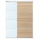 A SKYTTA dual-tone sliding closet door. One panel is white, the other light wood. The door has a sleek, modern design with four rectangular sections.