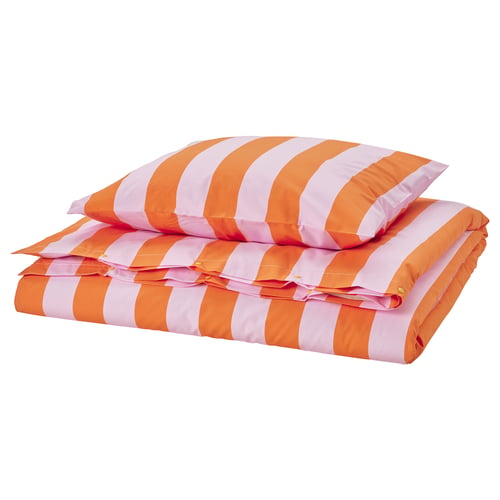 Bright orange and light pink striped bedding set, including duvet and pillowcases, made of cotton and viscose, folded neatly.
