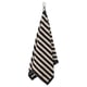 A hanging black and white striped towel, made of cotton, neatly folded with diagonal stripes.