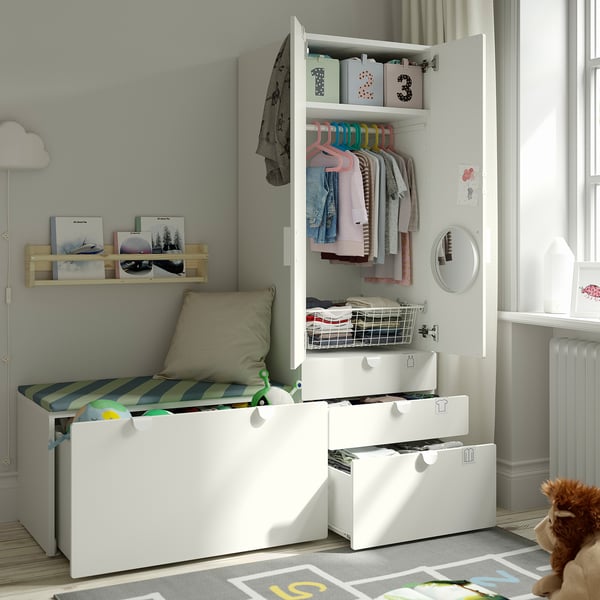 A well-organized childrens room with SMÅSTAD wardrobe, showing storage for clothes, toys, and books.