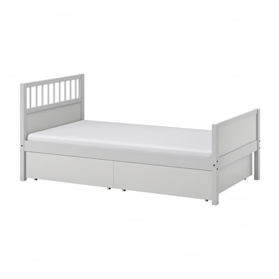 White SMYGA bed in pine with storage, classic design, vertical slats.