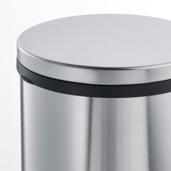 Stainless steel pedal bin with sleek design and black handle, great for kitchen or bathroom.