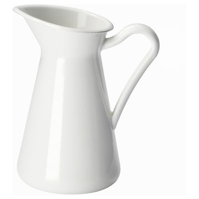 Depicts a white, ceramic SOCKERÄRT pitcher. It has a sleek, curved design with a single handle, suitable for pouring liquids.