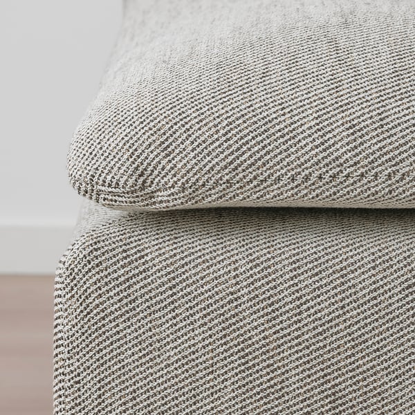 Close-up of a soft, textured patterson fabric sofa, showcasing its comfortable and inviting quality.