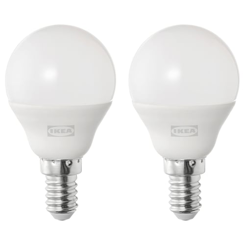 Two identical round SOLHETTA led bulbs in white colour, made of plastic and aluminium, standing side by side.