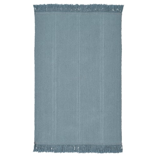 A light blue rectangular cotton rug with fringe on both ends, ideal for various floors.