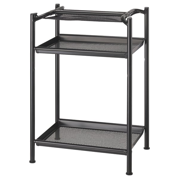 A black SPÄND storage unit with two mesh shelves and metal legs. Its designed for organising office supplies.