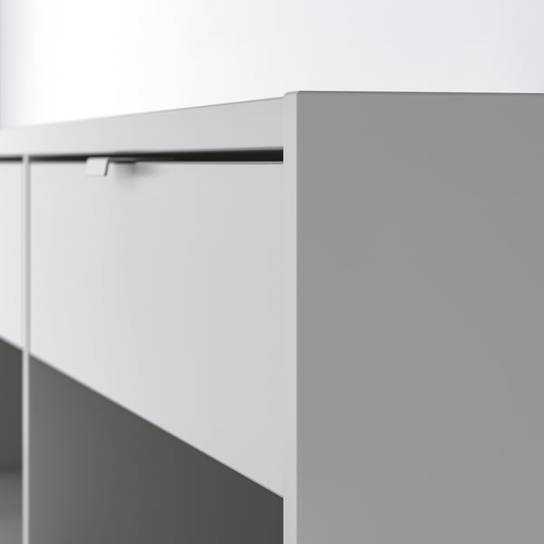 Modern sideboard with sleek, sliding door and clean lines. Quality materials and minimalist design.