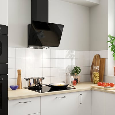 Black STACKBO hood with glass surface & led light. Sleek, modern design for kitchen.