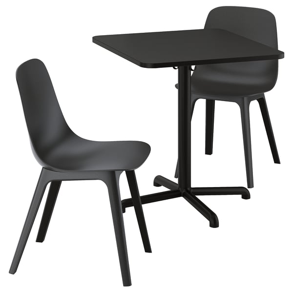 Black modern furniture set with square table and curved seat chairs.