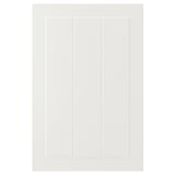 A white STENSUND cabinet door with vertical grooves and simple framed design.
