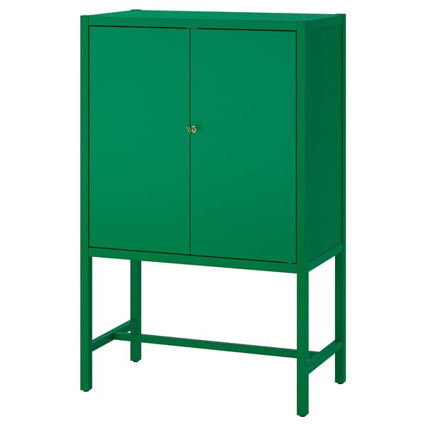 Green STOCKHOLM 2025 cabinet. Metal, rectangular, with two doors and brass key lock.